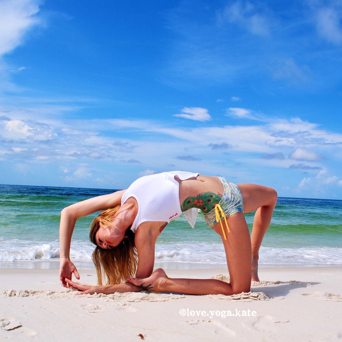 Yogi at a beach wearing GOF activewear