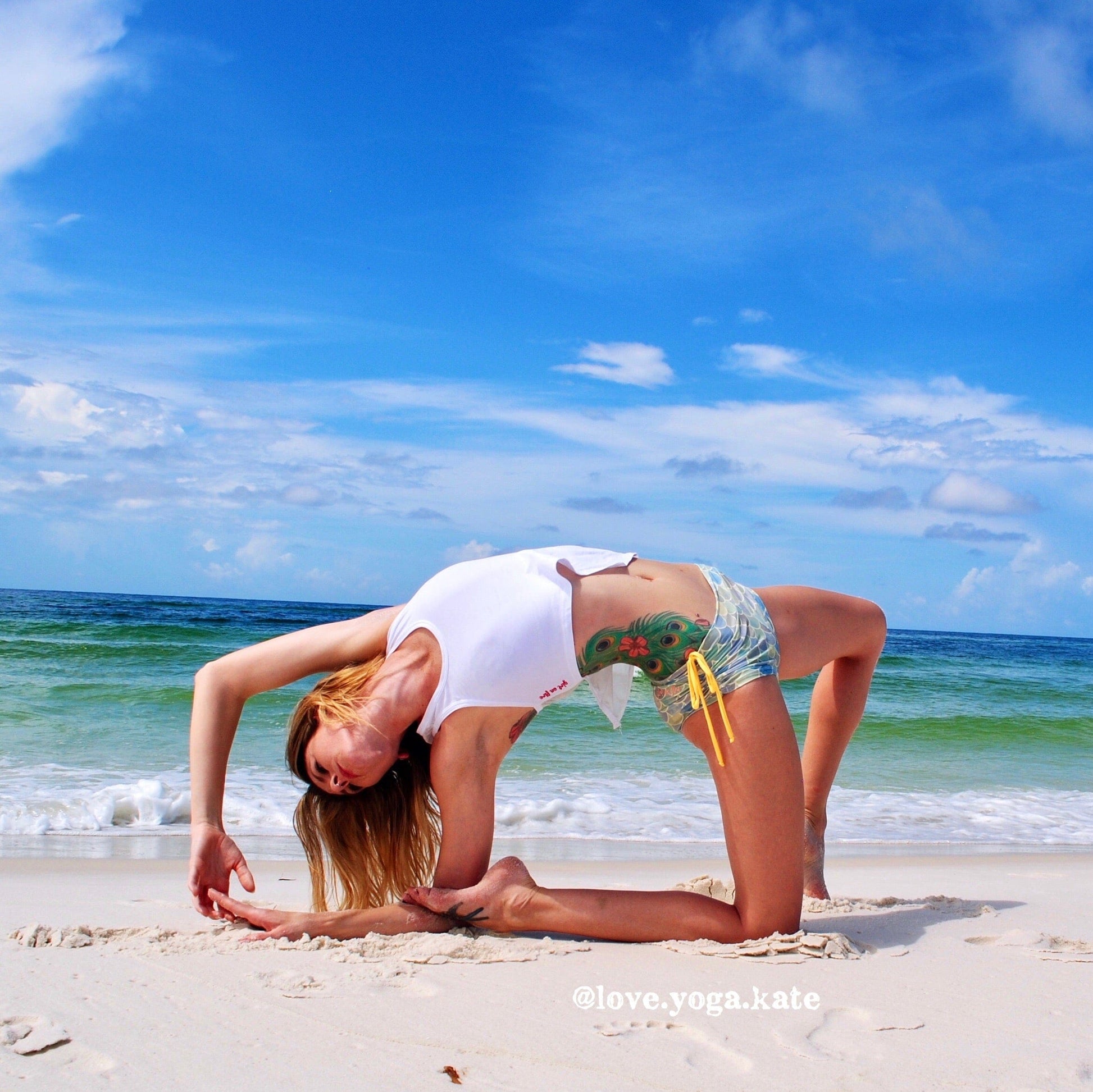 Yogi at a beach wearing GOF activewear