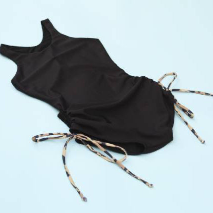 The Jane Shortie by GOF in Batgirl with meow/leopard string on a light blue background