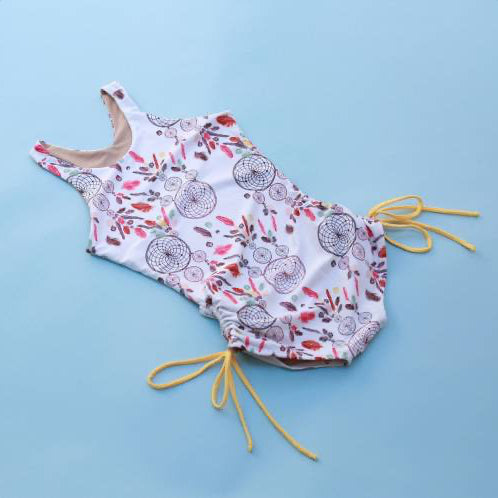 The Jane Shortie by Girl On Fire Artwewear in Sweet Dreams pattern on a blue background