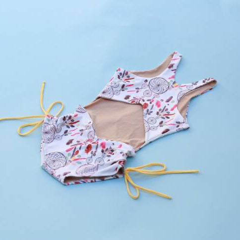 The Jane Shortie in dream catcher print with yellow strings on a light blue background