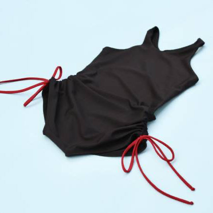 The Jane Shortie by Girl On Fire Artwear with red/love strings on a light blue background