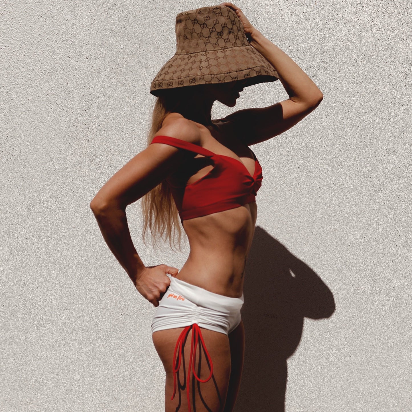 Angelica Jansen in Nini Bra and Neli Short by Girl On Fire Artwear with a Gucci Hat