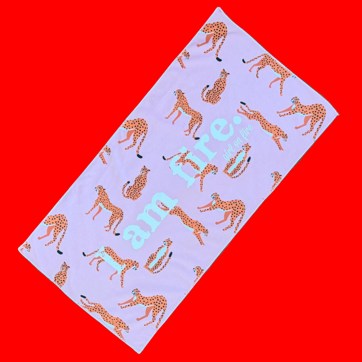 pink cheetah girl on fire towel on a red background